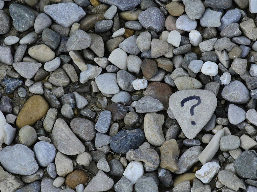 Rock with question mark on it